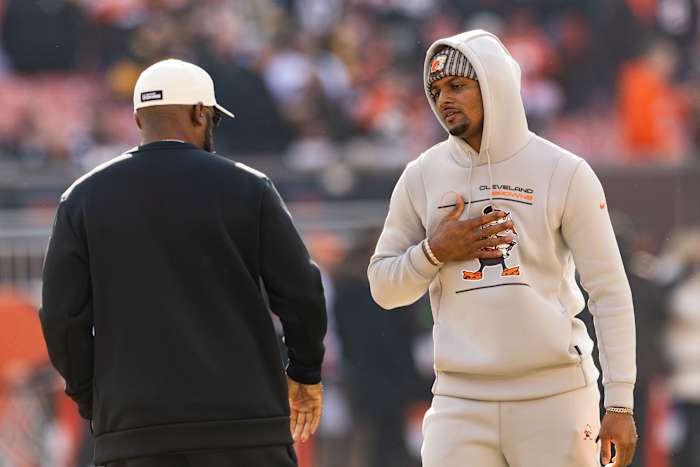 Nov 19, 2023; Cleveland, Ohio, USA; Cleveland Browns quarterback Deshaun Watson (4) talks with Pittsburgh Steelers head coach Mike Tomlin during warm ups before the game at Cleveland Browns Stadium.